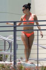 EVA LONGORIA in Bikini at a Pool at Her Hotel in Miami 06/30/2015