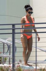 EVA LONGORIA in Bikini at a Pool at Her Hotel in Miami 06/30/2015