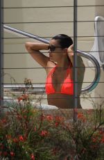 EVA LONGORIA in Bikini at a Pool at Her Hotel in Miami 06/30/2015