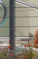 EVA LONGORIA in Bikini at a Pool at Her Hotel in Miami 06/30/2015