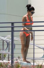 EVA LONGORIA in Bikini at a Pool at Her Hotel in Miami 06/30/2015