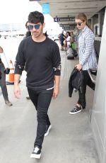GIGI HADID at Los Angeles International Airport 07/20/2015