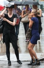 HAILEY and IRELAND BALDWIN Caught in the Rain in New York 07/30/2015