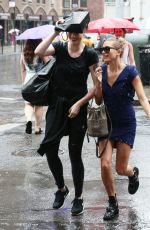 HAILEY and IRELAND BALDWIN Caught in the Rain in New York 07/30/2015