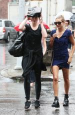 HAILEY and IRELAND BALDWIN Caught in the Rain in New York 07/30/2015
