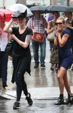 HAILEY and IRELAND BALDWIN Caught in the Rain in New York 07/30/2015