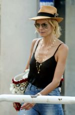 HEIDI KLUM at Leonardo Da Vinci Airport in Rome 07/17/2015