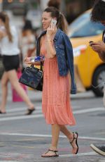 HILARY SWANK on the Phone Out in Chelsea 07/28/2015