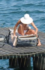 IRINA SHAYK in Bkini at a Beach in Italy 07/17/2015