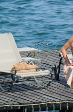 IRINA SHAYK in Bkini at a Beach in Italy 07/17/2015