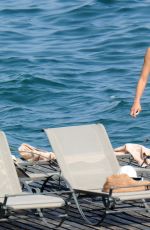 IRINA SHAYK in Bkini at a Beach in Italy 07/17/2015