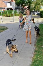 JOANNA KRUPA at a Photoshoot with Her Dogs in Warsaw 07/25/2015