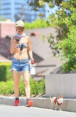 JULIETTE LEWIS in Bikini Top Walks Her Dog Out in Los Angeles 07/29/2015