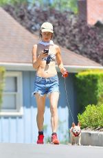 JULIETTE LEWIS in Bikini Top Walks Her Dog Out in Los Angeles 07/29/2015