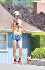 JULIETTE LEWIS in Bikini Top Walks Her Dog Out in Los Angeles 07/29/2015