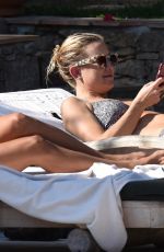 KATE HUDSON in Bikini at a Pool in St. Tropez 07/22/2015