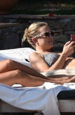 KATE HUDSON in Bikini at a Pool in St. Tropez 07/22/2015
