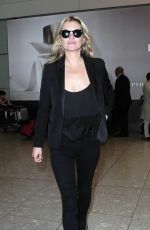 KATE MOSS at Heathrow Airport in London 07/15/2015
