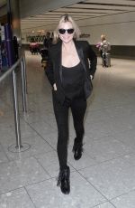 KATE MOSS at Heathrow Airport in London 07/15/2015