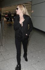 KATE MOSS at Heathrow Airport in London 07/15/2015