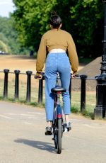 KENDALL JENNER Riding a Bike Out in London 06/29/2015