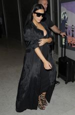 KIM KARDASHIAN Arrives at Charles De Gaulle Airport in Paris 07/20/2015