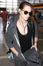 KRISTEN STEWART Arrives at Charles de Gaulle Airport in Paris 07/20/2015