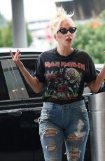 LADY GAGA in Ripped Jeans Arrives at JFK Airport in New York 07/01/2015