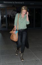 LAURA WHITMORE Arrives at Heathrow Airport in London 07/15/2015
