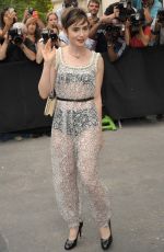 LILY COLLINS Arrives at Chanel Fashion Show in Paris