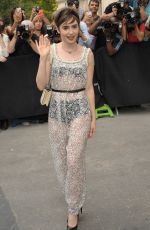 LILY COLLINS Arrives at Chanel Fashion Show in Paris