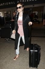 LILY COLLINS at Los Angeles International Airport 07/11/2015