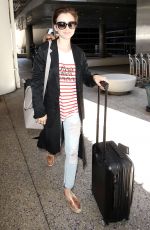 LILY COLLINS at Los Angeles International Airport 07/11/2015