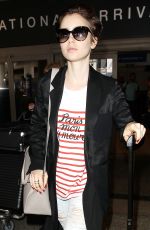 LILY COLLINS at Los Angeles International Airport 07/11/2015
