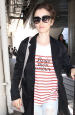 LILY COLLINS at Los Angeles International Airport 07/11/2015