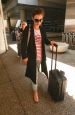 LILY COLLINS at Los Angeles International Airport 07/11/2015