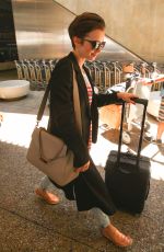LILY COLLINS at Los Angeles International Airport 07/11/2015