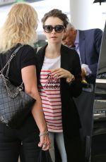 LILY COLLINS at Los Angeles International Airport 07/11/2015
