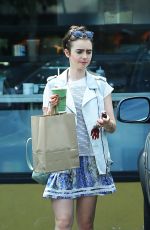 LILY COLLINS Leaves Earthbar in West Hollywood 07/19/2015