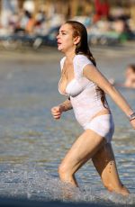 LINDSAY LOHAN Out Swimming at a Beach in Mykonos 07/20/2015