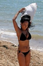 LISA MAFFIA in Bikini at a Beach in Essex
