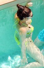 LUISA ZISSMAN in Bikini on Engagement Break at a Pool in Itay