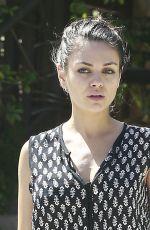 MILA KUNIS Leaves Suzanne