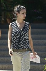 MILA KUNIS Leaves Suzanne