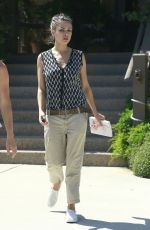MILA KUNIS Leaves Suzanne