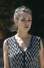 MILA KUNIS Leaves Suzanne