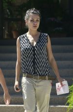 MILA KUNIS Leaves Suzanne