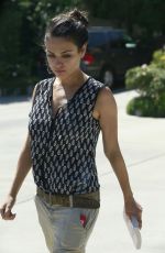 MILA KUNIS Leaves Suzanne