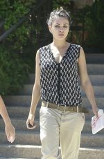 MILA KUNIS Leaves Suzanne