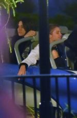MILEY CYRUS and STELLA MAXWELL at Disneyland in Anaheim 07/14/2015